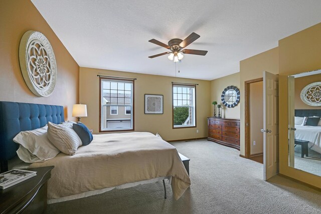 16618 72nd Ct NE, Otsego, MN 55330 - bedroom featuring carpet flooring, a ceiling fan, and a textured ceiling