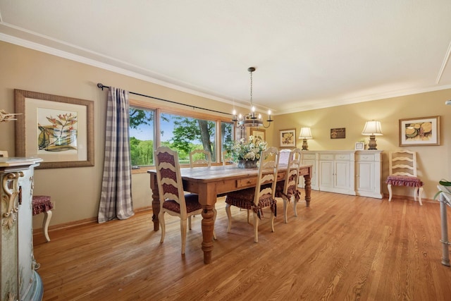 940 Brown Rd S, Wayzata, MN 55391 - dining room with ornamental molding, a chandelier, and light wood finished floors