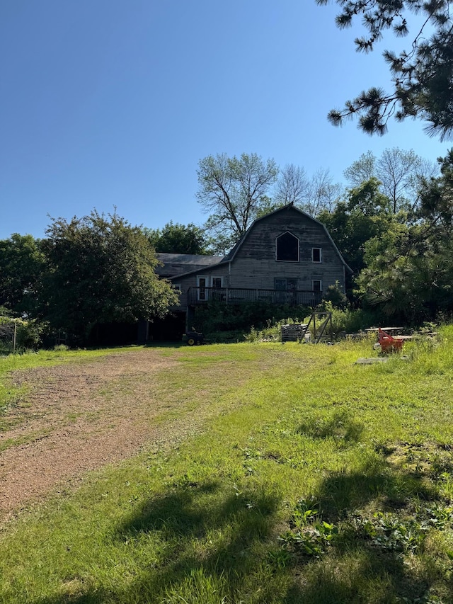 940 Brown Rd S, Wayzata, MN 55391 - view of green lawn featuring driveway and a barn