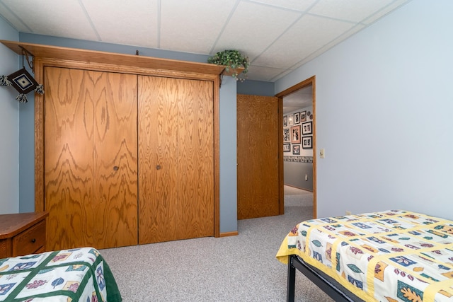 350 3rd St NE, Mcintosh, MN 56556 - carpeted bedroom featuring a paneled ceiling and a closet