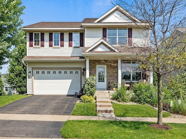 13503 Carlingford Way, Rosemount, MN 55068 - view of front of property with asphalt driveway, an attached garage, and a shingled roof