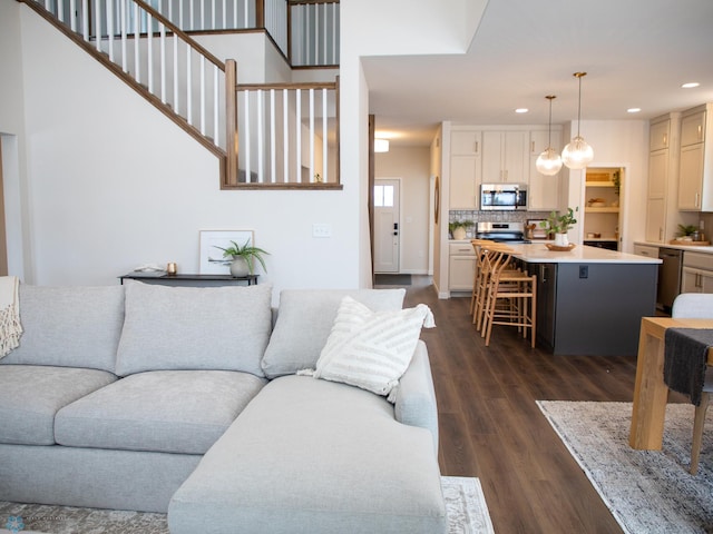 1449 66th Ave S, Fargo, ND 58104 - living area with recessed lighting and dark wood-style floors