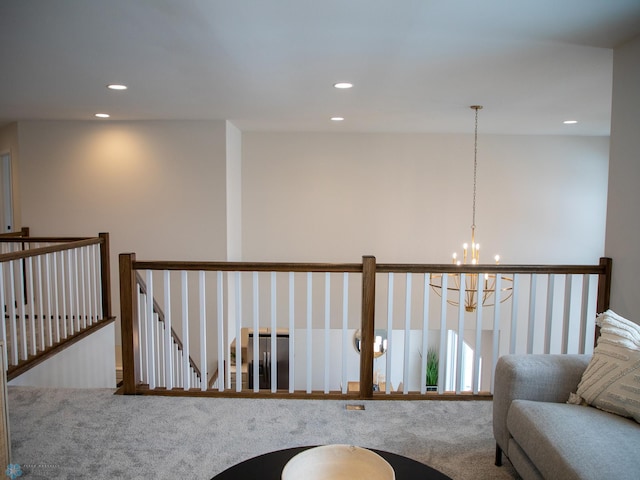 1449 66th Ave S, Fargo, ND 58104 - sitting room with a chandelier, recessed lighting, carpet flooring, and an upstairs landing