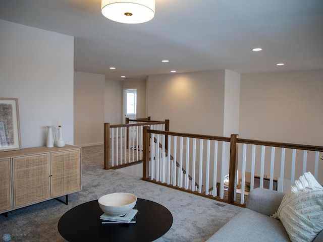 1449 66th Ave S, Fargo, ND 58104 - living area featuring an upstairs landing, carpet, and recessed lighting