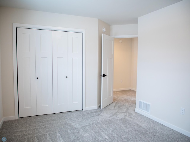 1449 66th Ave S, Fargo, ND 58104 - unfurnished bedroom with carpet flooring and a closet
