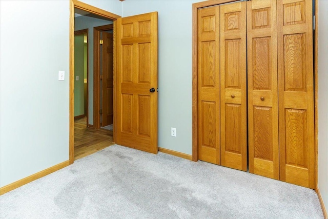 8335 Bush Lake Rd, Bloomington, MN 55438 - unfurnished bedroom featuring carpet flooring and a closet