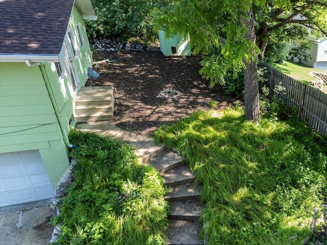 8335 Bush Lake Rd, Bloomington, MN 55438 - view of yard featuring a garage