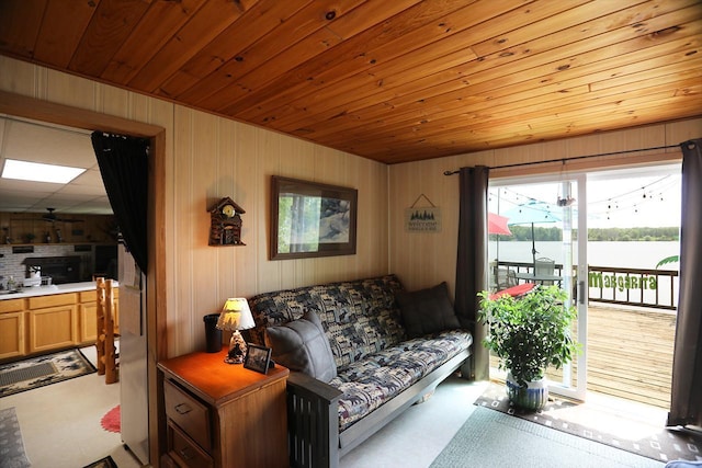 1198 Mink Rd, Ellsburg Twp, MN 55724 - living room with a water view, wood walls, and wood ceiling