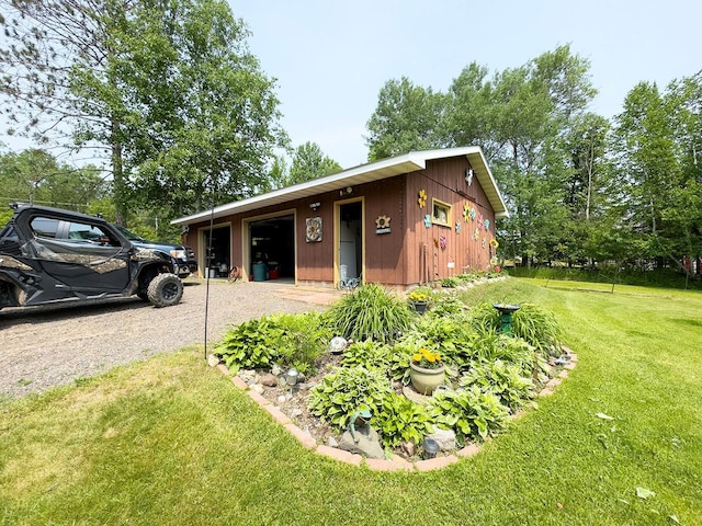 1198 Mink Rd, Ellsburg Twp, MN 55724 - view of front of property featuring an outdoor structure and a front lawn