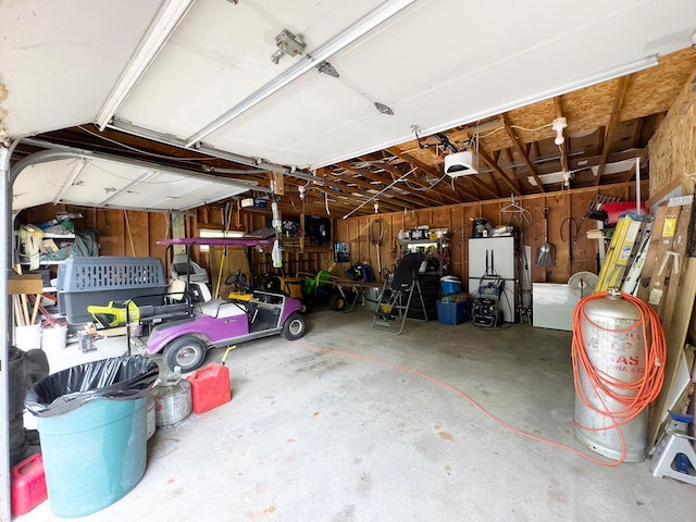 1198 Mink Rd, Ellsburg Twp, MN 55724 - garage featuring a garage door opener