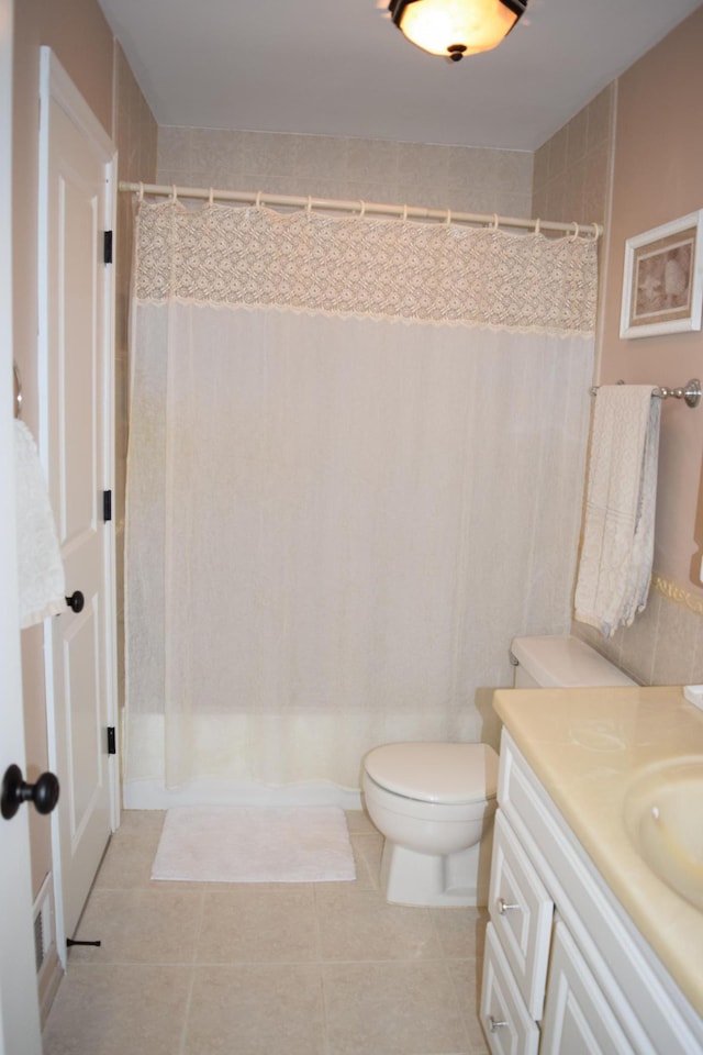 12115 50th Ave N, Plymouth, MN 55442 - full bath featuring vanity, curtained shower, and tile patterned floors