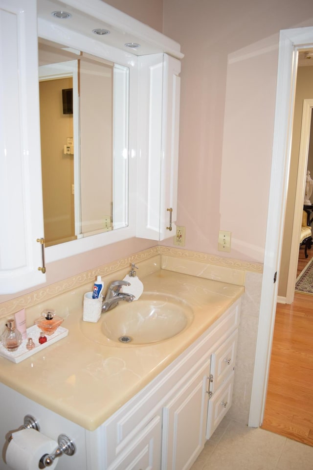 12115 50th Ave N, Plymouth, MN 55442 - bathroom featuring vanity and tile patterned flooring