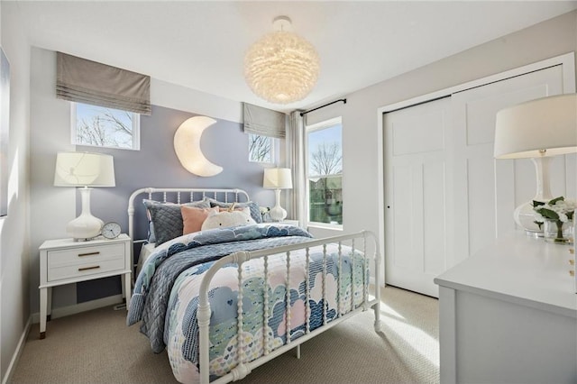 10391 Glacier Ln N, Maple Grove, MN 55369 - carpeted bedroom with multiple windows and a closet