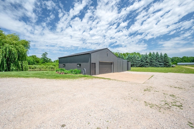 6257 185th Ave SE, Santiago Twp, MN 55308 - view of pole building with dirt driveway and a lawn