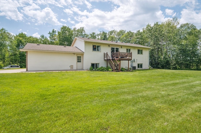 6257 185th Ave SE, Santiago Twp, MN 55308 - back of property with stairs, a deck, and a yard