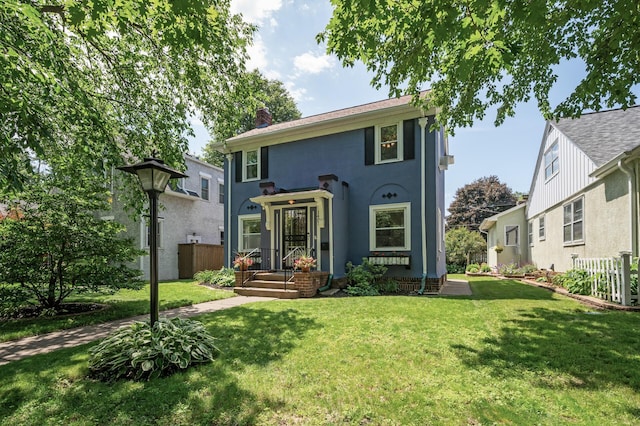 1407 Pascal St N, Saint Paul, MN 55108 - view of front of house with a chimney and stucco siding