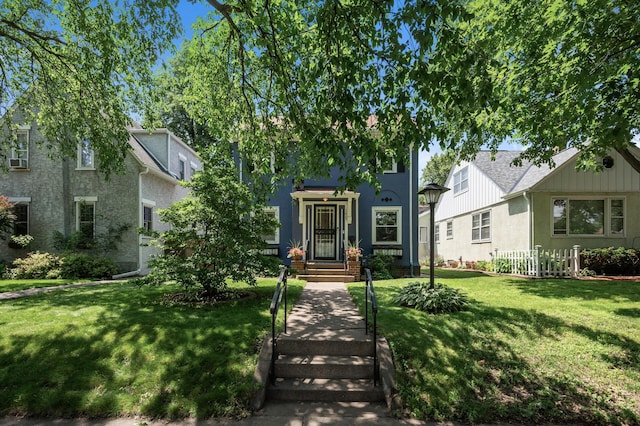 1407 Pascal St N, Saint Paul, MN 55108 - view of front of home with a front yard and stucco siding
