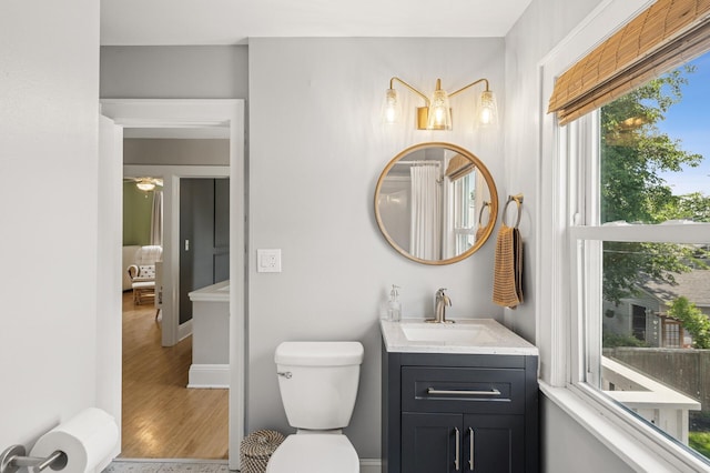 1407 Pascal St N, Saint Paul, MN 55108 - bathroom featuring vanity and wood finished floors