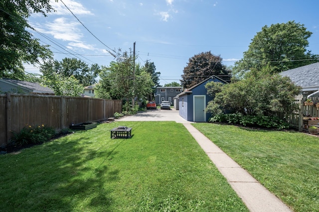 1407 Pascal St N, Saint Paul, MN 55108 - view of yard with a fire pit