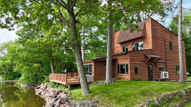 3025 Viewpoint Rd, Isle, MN 56342 - view of side of home featuring a wooden deck and a yard