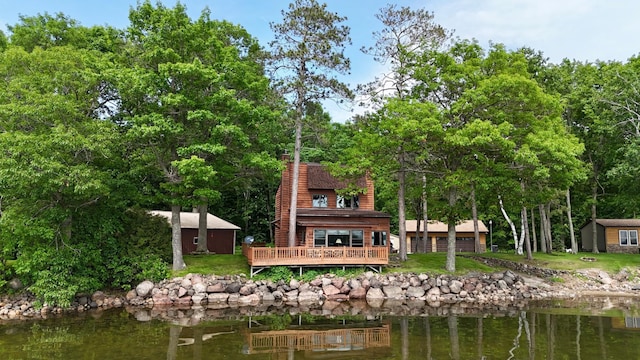 3025 Viewpoint Rd, Isle, MN 56342 - rear view of property with a deck with water view and a storage unit