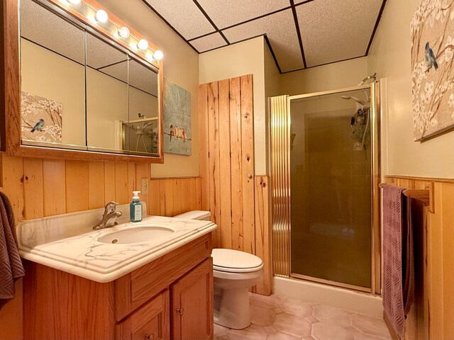 3025 Viewpoint Rd, Isle, MN 56342 - bathroom with wainscoting, tile patterned floors, a stall shower, vanity, and a drop ceiling
