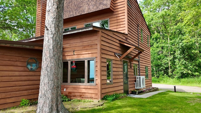 3025 Viewpoint Rd, Isle, MN 56342 - view of side of property with a chimney and a yard