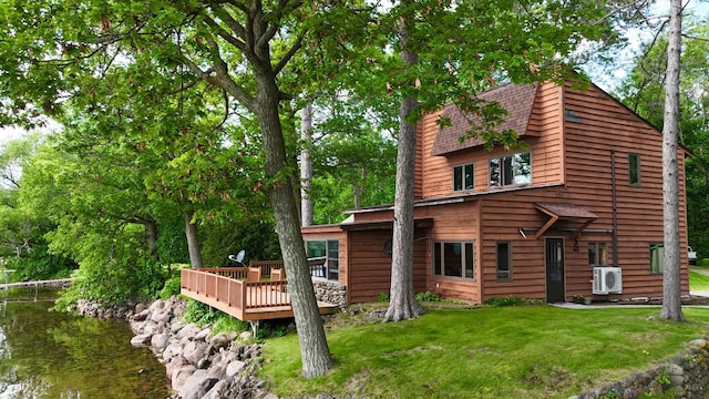 3025 Viewpoint Rd, Isle, MN 56342 - rear view of house with a wooden deck and a yard