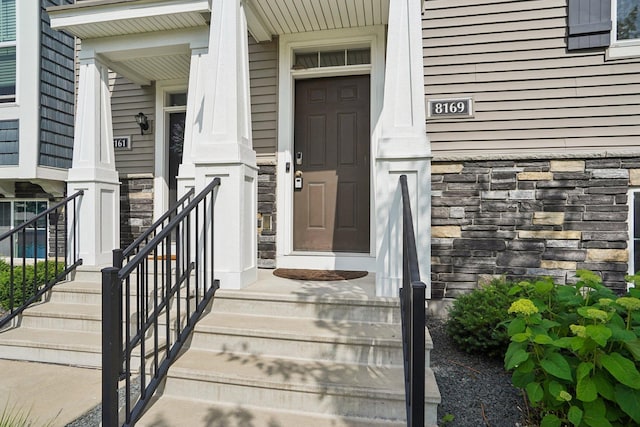 8169 Central Park Way N, Maple Grove, MN 55369 - view of exterior entry featuring stone siding