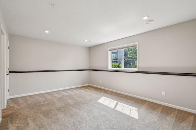 8169 Central Park Way N, Maple Grove, MN 55369 - unfurnished room with carpet flooring and recessed lighting