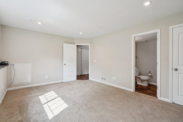 8169 Central Park Way N, Maple Grove, MN 55369 - unfurnished bedroom featuring carpet flooring, recessed lighting, and ensuite bathroom