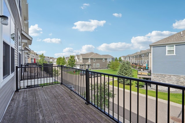 8169 Central Park Way N, Maple Grove, MN 55369 - wooden terrace featuring a residential view