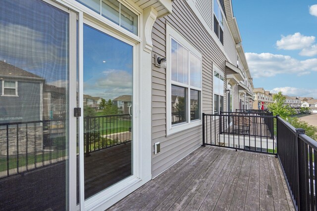 8169 Central Park Way N, Maple Grove, MN 55369 - wooden deck with a residential view