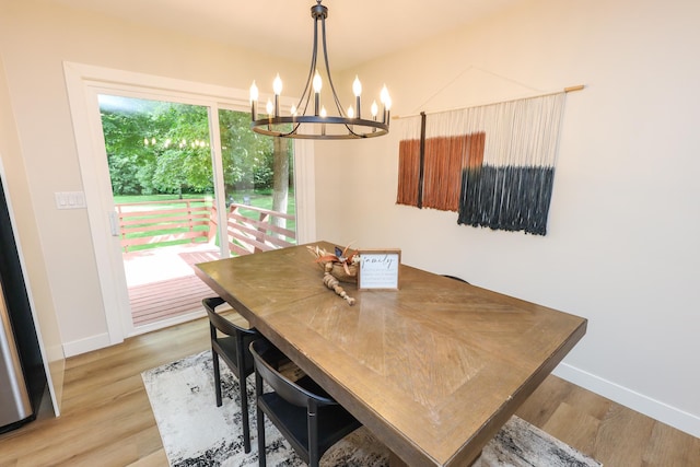 7719 Canary Rd SW, Alexandria, MN 56308 - dining space with a chandelier and light wood finished floors