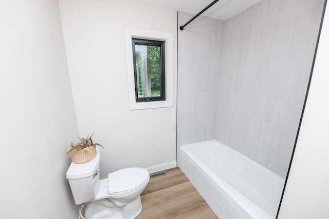 7719 Canary Rd SW, Alexandria, MN 56308 - bathroom featuring wood finished floors and shower / bathtub combination