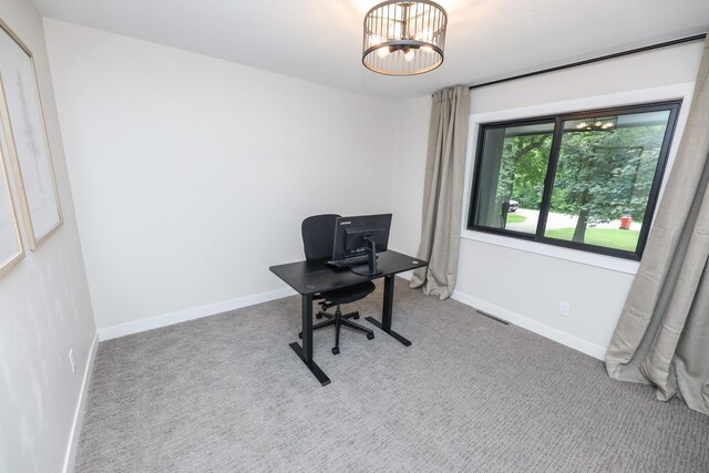 7719 Canary Rd SW, Alexandria, MN 56308 - office with a chandelier and carpet