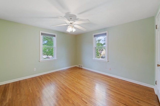 1105 9th Ave NW, Rochester, MN 55901 - unfurnished room with light wood-type flooring and a ceiling fan