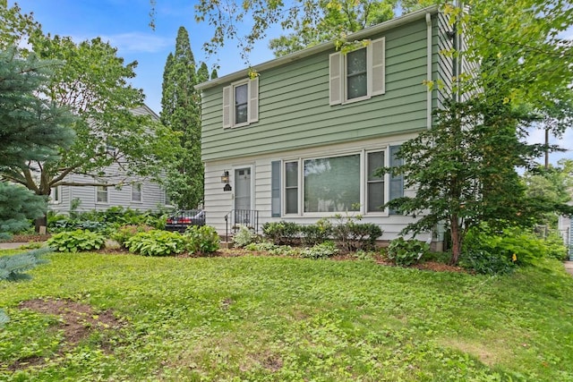 1105 9th Ave NW, Rochester, MN 55901 - colonial home featuring a front yard