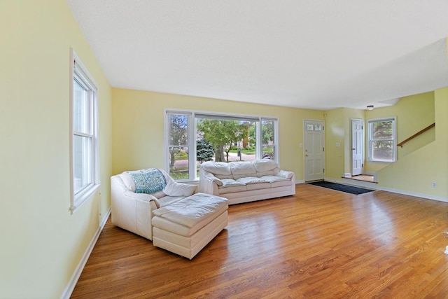 1105 9th Ave NW, Rochester, MN 55901 - living room with wood finished floors and stairway