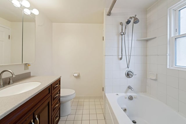 1105 9th Ave NW, Rochester, MN 55901 - full bath with tile patterned floors, vanity, healthy amount of natural light, and shower / tub combination
