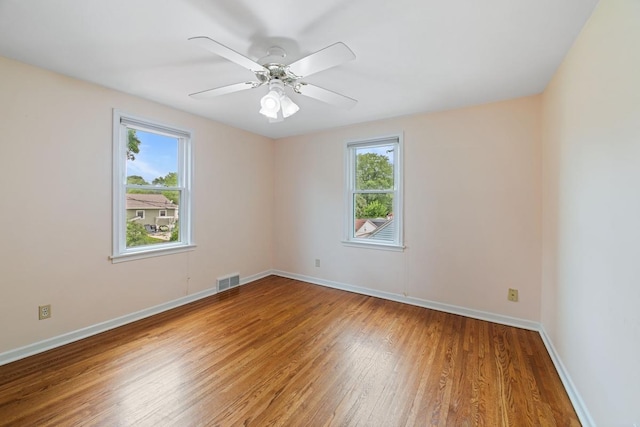 1105 9th Ave NW, Rochester, MN 55901 - spare room with light wood-style floors and a ceiling fan