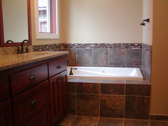 1176X Forestview Dr, Baxter, MN 56425 - bathroom with vanity and a garden tub