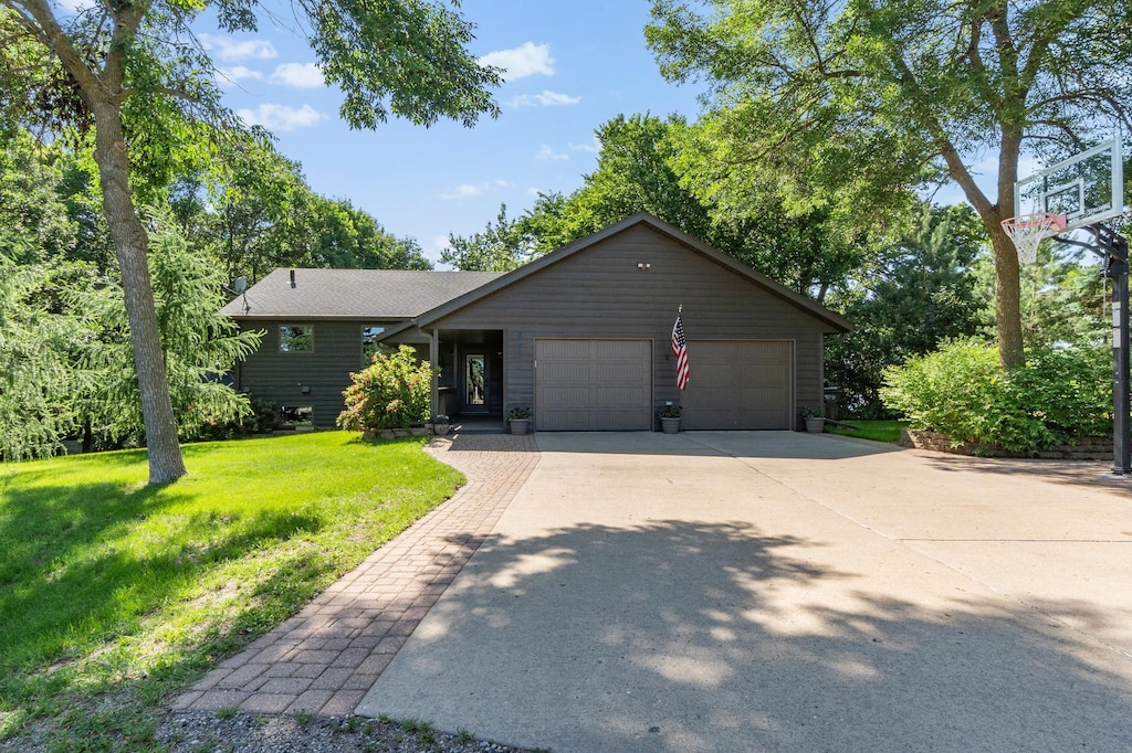 8442 Union Lake Dr SE, Alexandria, MN 56308 - ranch-style house with a garage, a front yard, and driveway