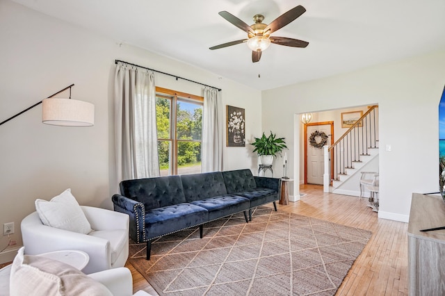 2352 90th Ave, Osceola, WI 54020 - living room with stairway, hardwood / wood-style floors, and ceiling fan
