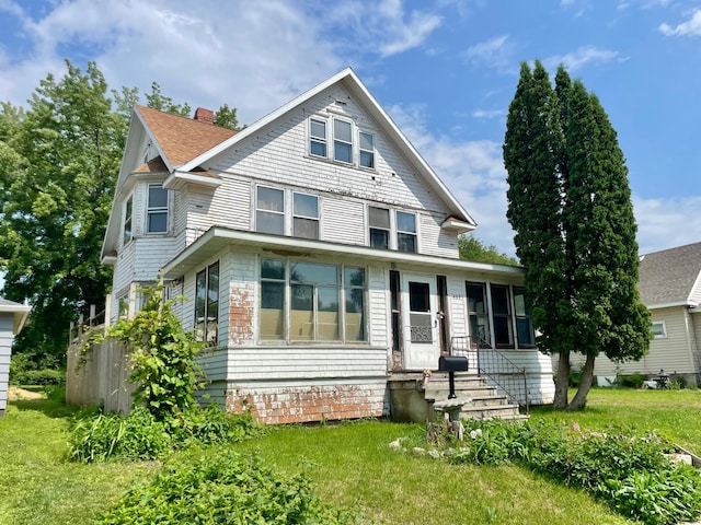 407 Minnesota St, Redwood Falls, MN 56283 - view of front of home featuring a chimney and a shingled roof