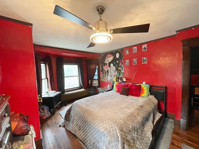 407 Minnesota St, Redwood Falls, MN 56283 - bedroom featuring radiator, wood-type flooring, and a ceiling fan