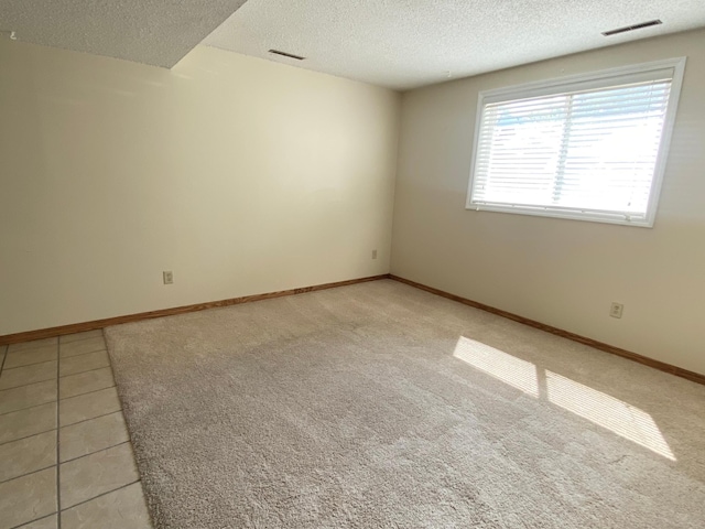 1111 13th St, Brainerd, MN 56401 - spare room featuring a textured ceiling and baseboards