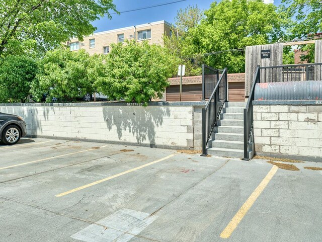 2700 44th St Unit 116, Minneapolis, MN 55410 - uncovered parking lot with stairs