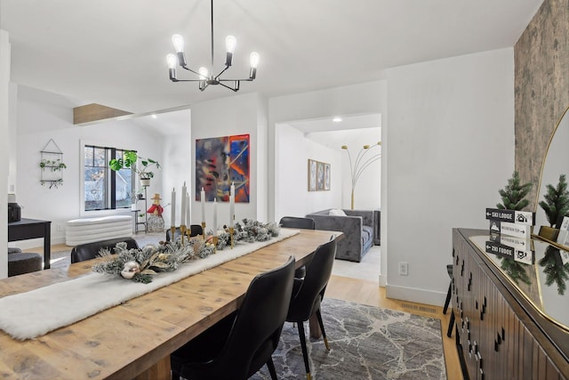 1611 Hill Ridge Ter, Minnetonka, MN 55305 - dining area with a chandelier and light wood-type flooring