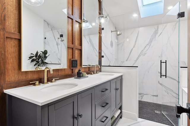 1611 Hill Ridge Ter, Minnetonka, MN 55305 - bathroom with a marble finish shower, double vanity, and a skylight